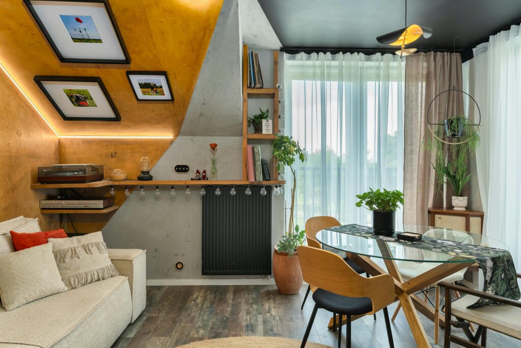 Stylish modern living room with unique decor, indoor plants, and contemporary furniture.