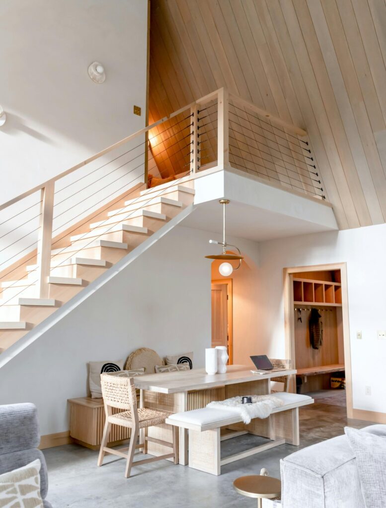Elegant Scandinavian-style living space featuring minimalist decor and natural wood accents.
